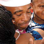 640px-A_Sailor_hugs_his_wife